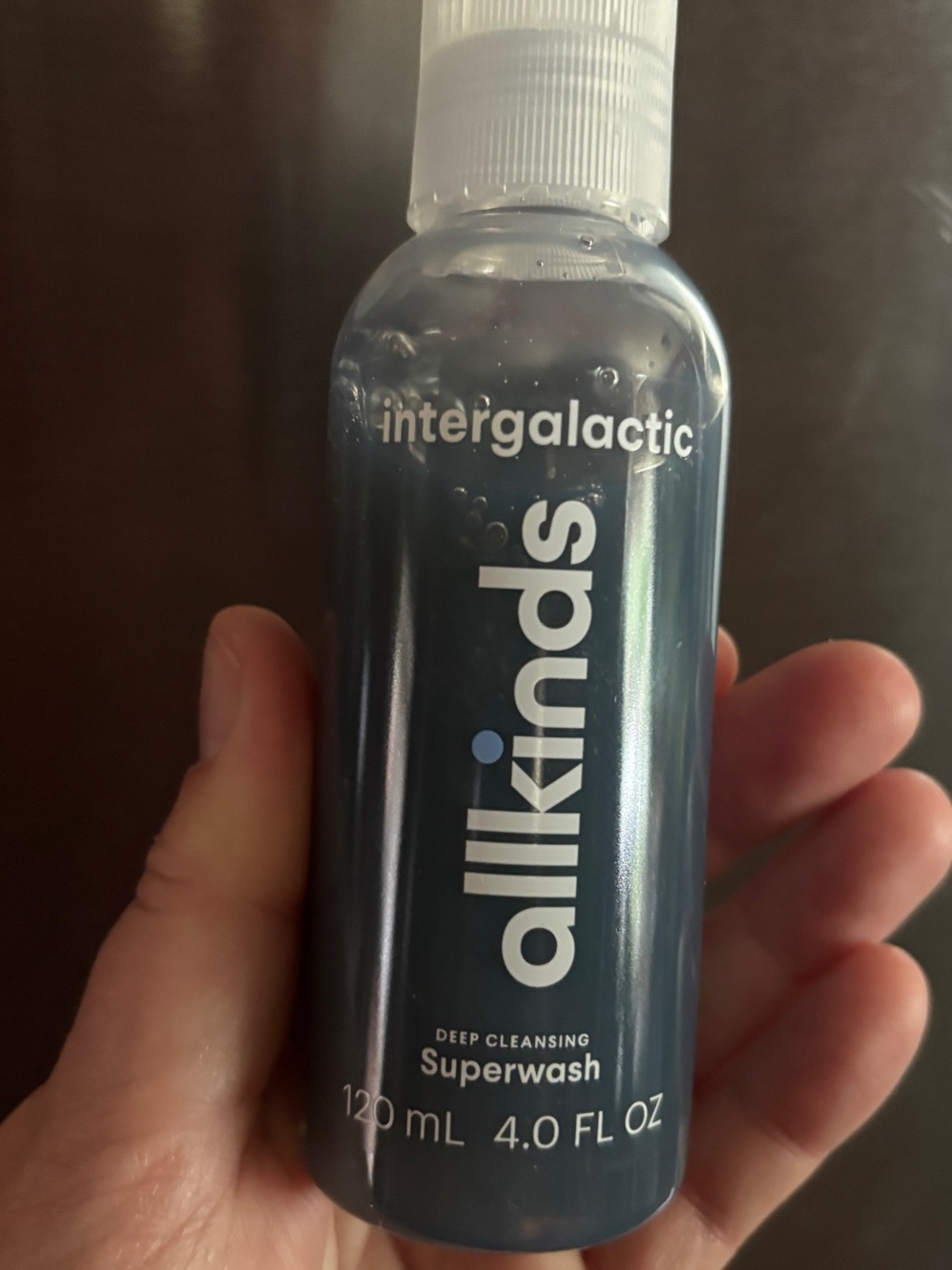 travel-sized bottle of Allkinds Intergalactic Deep Cleansing Superwash
